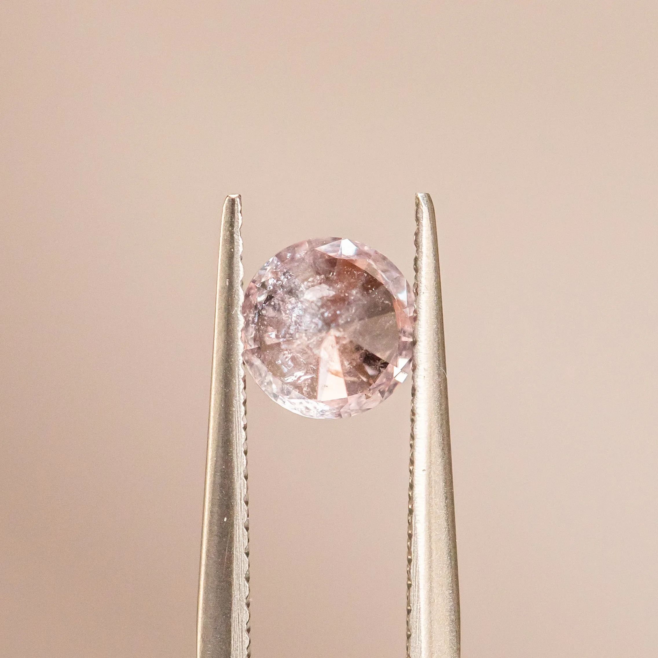 1.09CT ROUND MONTANA SAPPHIRE, CHERRY BLOSSOM PINK, 6.12X4.04MM, UNTREATED