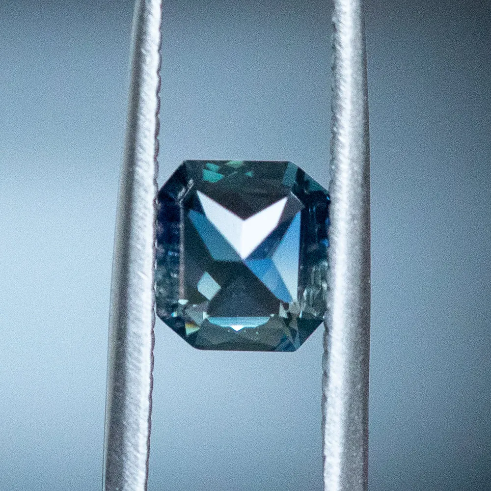 1.25CT RADIANT CUT MADAGASCAR TEAL BLUE PARTI SAPPHIRE, 6.68X6.04X3.48MM