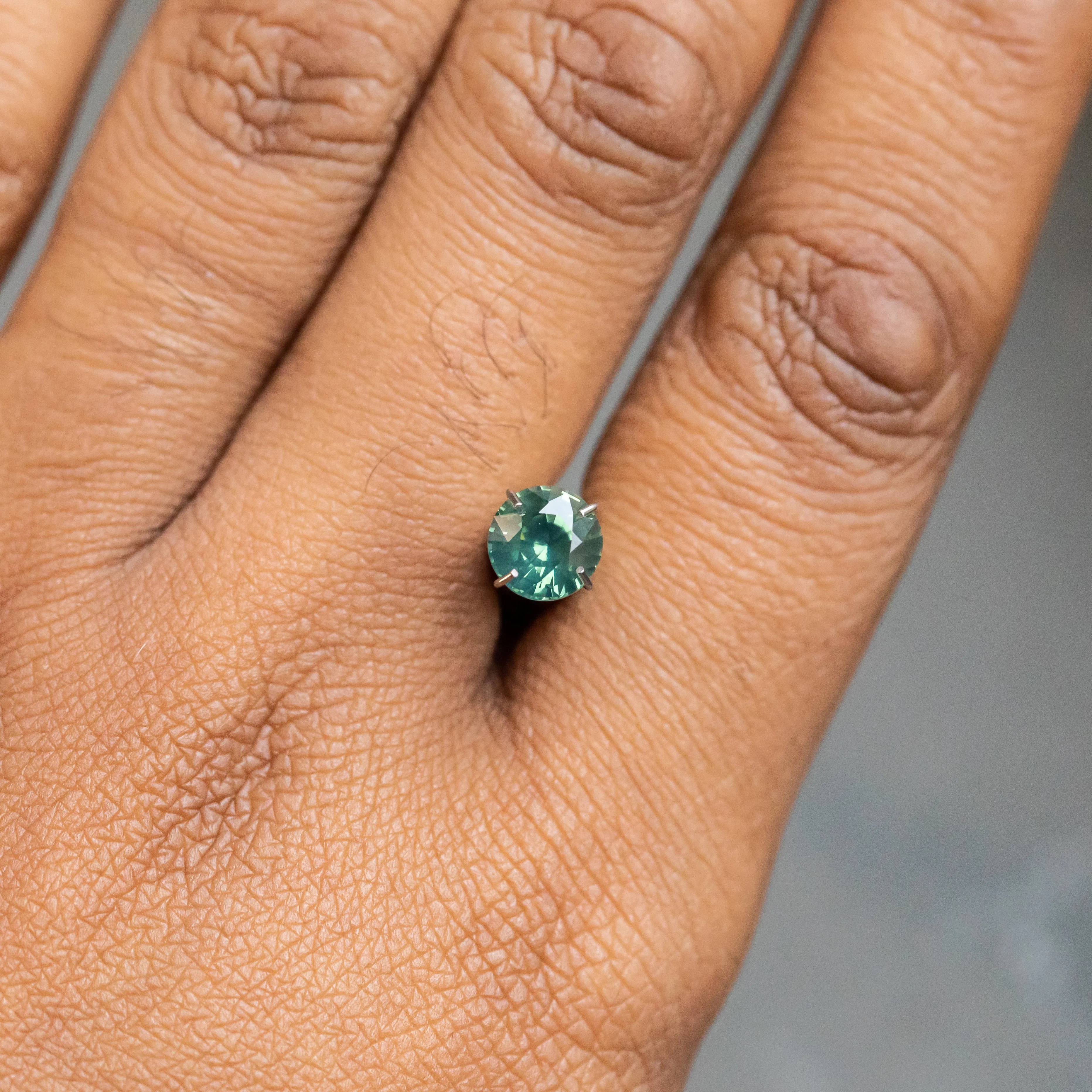 1.29CT ROUND AFRICAN SAPPHIRE, TEAL GREEN, 6.43X4.05MM