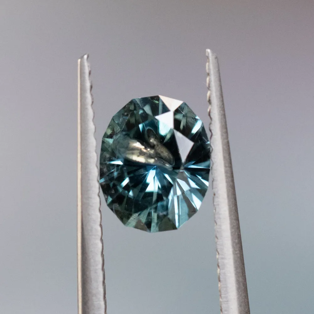 1.36CT PRECISION CUT OVAL MONTANA SAPPHIRE, MEDIUM TEAL BLUE GREY, 7X5.4MM