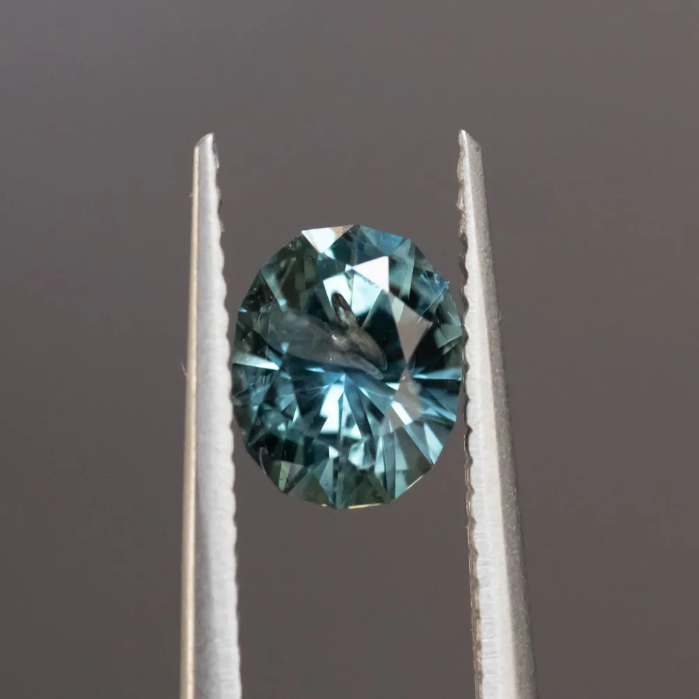 1.36CT PRECISION CUT OVAL MONTANA SAPPHIRE, MEDIUM TEAL BLUE GREY, 7X5.4MM