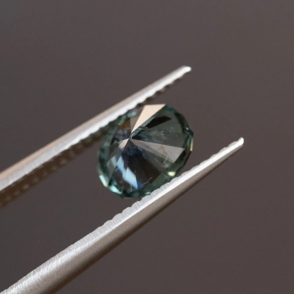 1.36CT PRECISION CUT OVAL MONTANA SAPPHIRE, MEDIUM TEAL BLUE GREY, 7X5.4MM