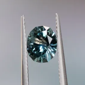 1.36CT PRECISION CUT OVAL MONTANA SAPPHIRE, MEDIUM TEAL BLUE GREY, 7X5.4MM