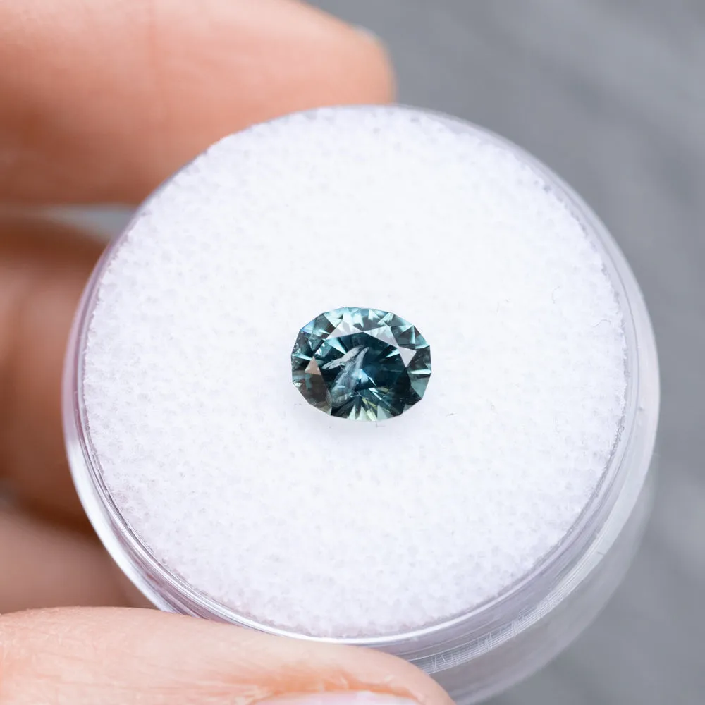 1.36CT PRECISION CUT OVAL MONTANA SAPPHIRE, MEDIUM TEAL BLUE GREY, 7X5.4MM