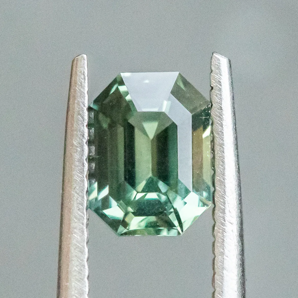 1.58CT EMERALD CUT MADAGASCAR SAPPHIRE, MEDIUM BLUE TEAL WITH GREEN, 7.34X5.49X4.08MM