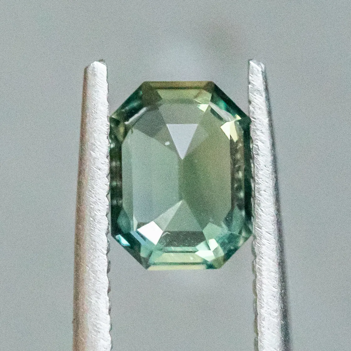 1.58CT EMERALD CUT MADAGASCAR SAPPHIRE, MEDIUM BLUE TEAL WITH GREEN, 7.34X5.49X4.08MM