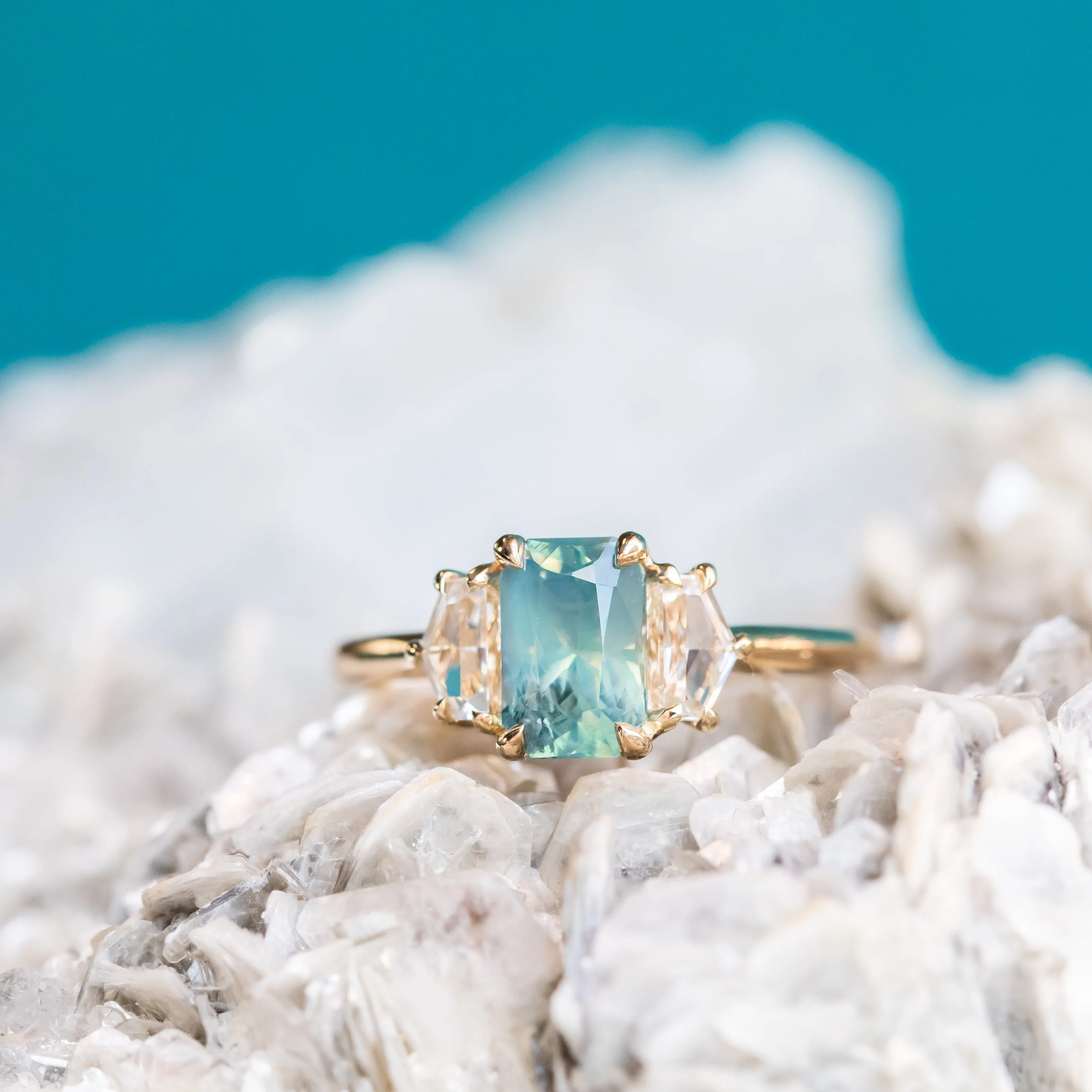 24 HOUR HOLD - 1.47ct Radiant Opalescent Teal Sapphire and White Sapphire Three Stone Ring in 14k Yellow Gold