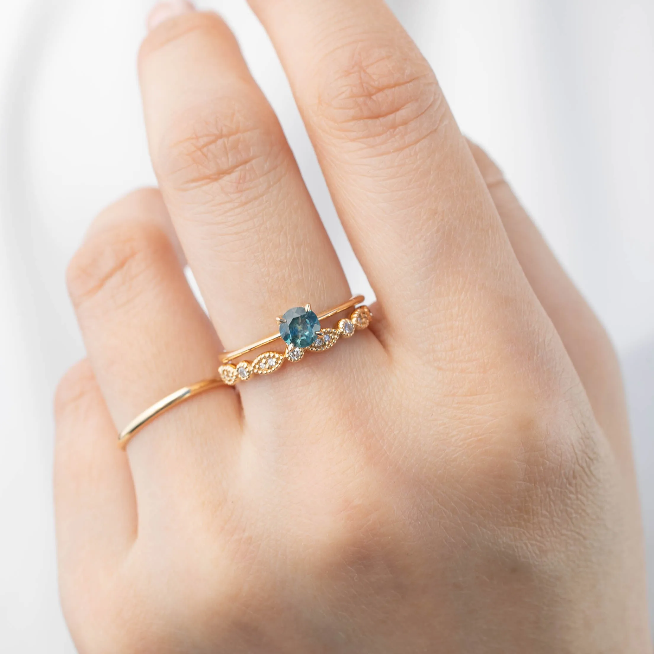 Sara Ring - 5mm 0.55ct Teal Blue Montana Sapphire